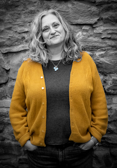Sherrie-flick-400x570 Sherrie Flick portrait with brick wall